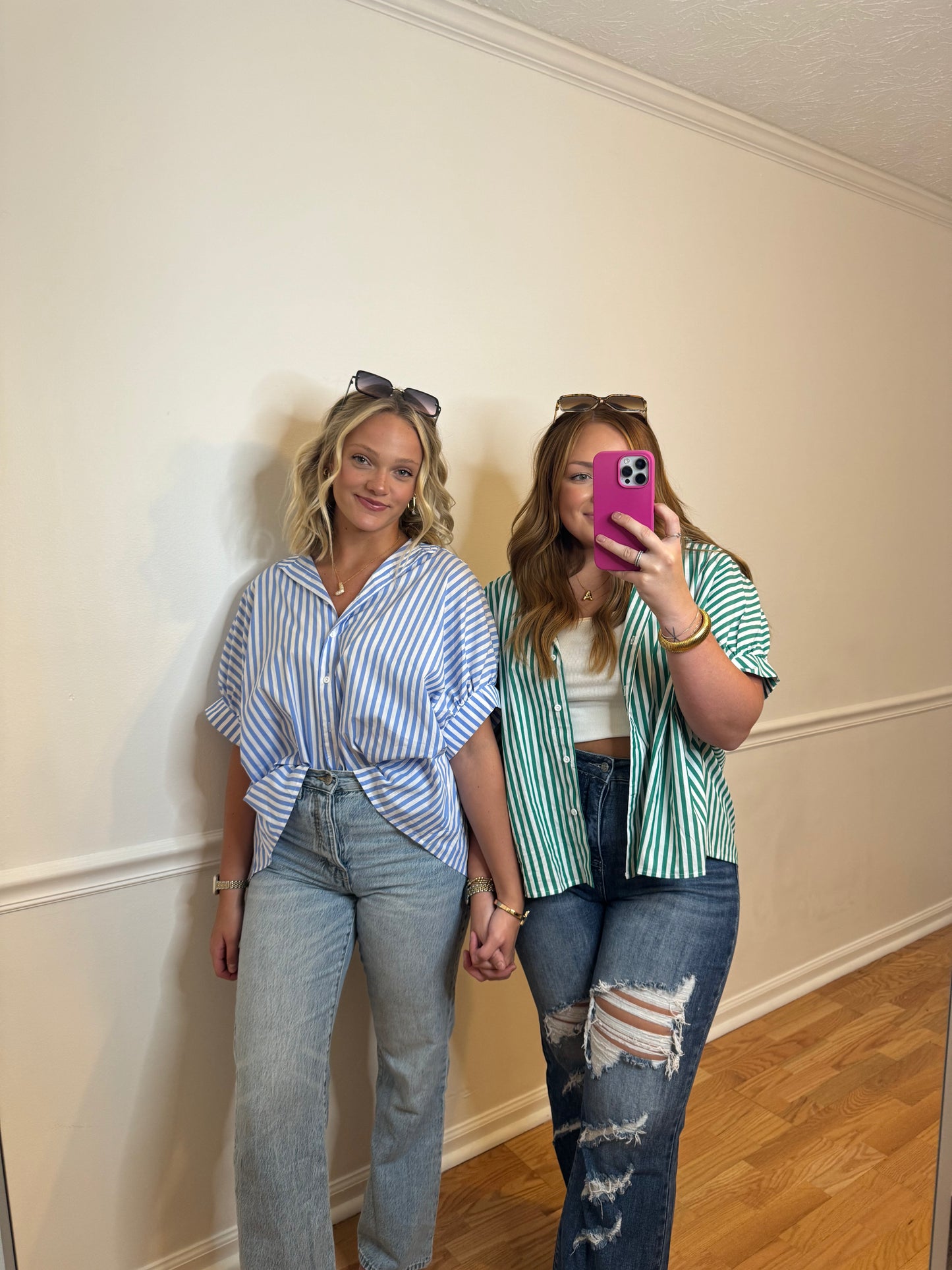 Peyton (in blue) is wearing a S. Ashlen (in green) is wearing a M.
