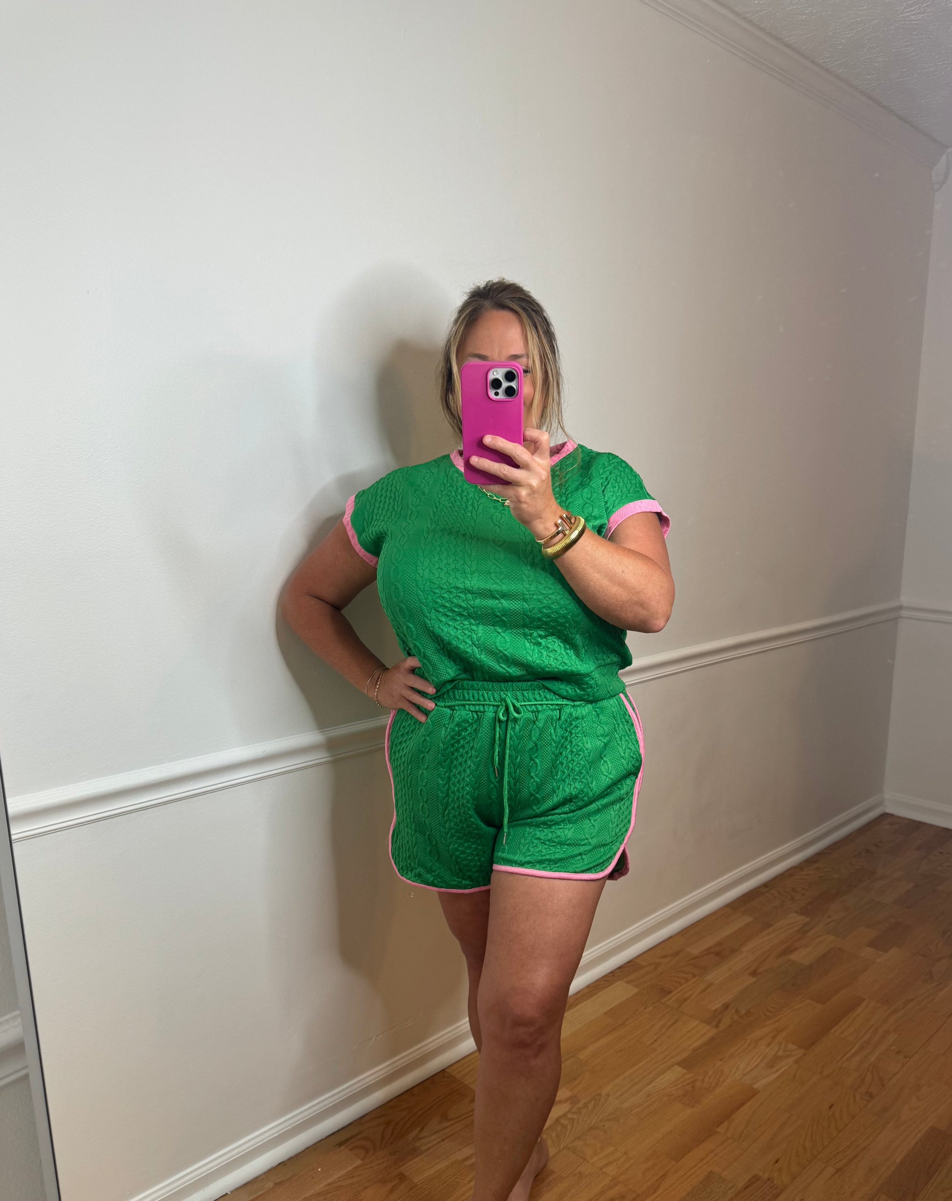 Lesley is wearing a XL.